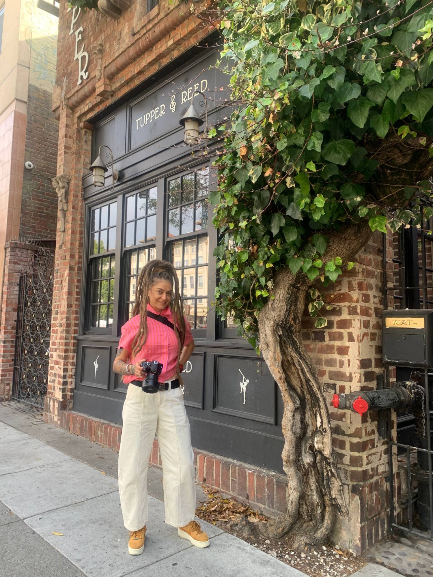 Christina with her camera in downtown Berkeley
